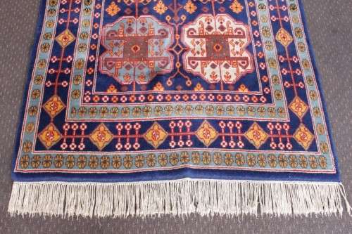 A beautiful and very well made colourful Russian Derbent carpet in light & dark blue, reds and rust