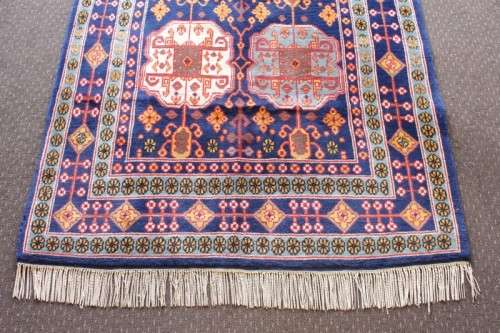 A beautiful and very well made colourful Russian Derbent carpet in light & dark blue, reds and rust