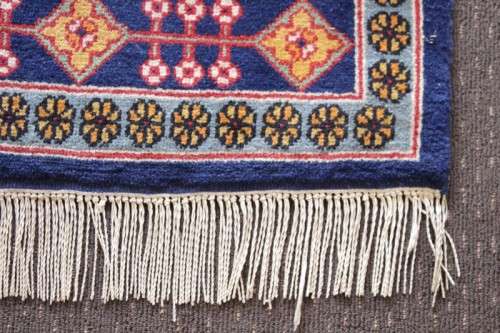 A beautiful and very well made colourful Russian Derbent carpet in light & dark blue, reds and rust