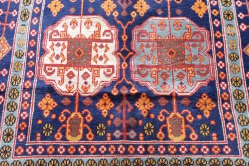 A beautiful and very well made colourful Russian Derbent carpet in light & dark blue, reds and rust