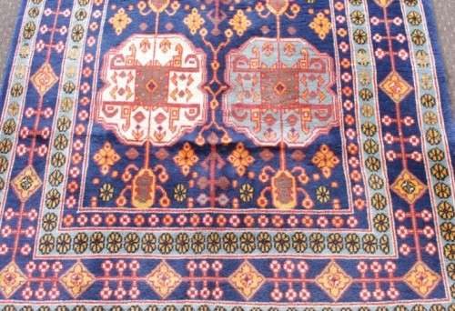 A beautiful and very well made colourful Russian Derbent carpet in light & dark blue, reds and rust
