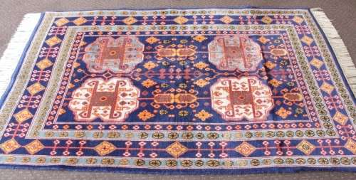 A beautiful and very well made colourful Russian Derbent carpet in light & dark blue, reds and rust