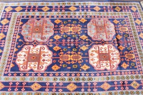 A beautiful and very well made colourful Russian Derbent carpet in light & dark blue, reds and rust