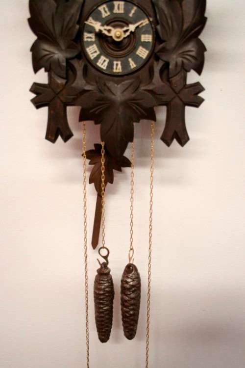 A fabulous rare original vintage hand carved German made 8-day Black Forest cuckoo clock.