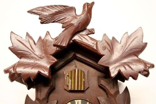 A fabulous rare original vintage hand carved German made 8-day Black Forest cuckoo clock.