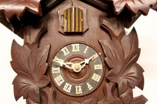 A fabulous rare original vintage hand carved German made 8-day Black Forest cuckoo clock.