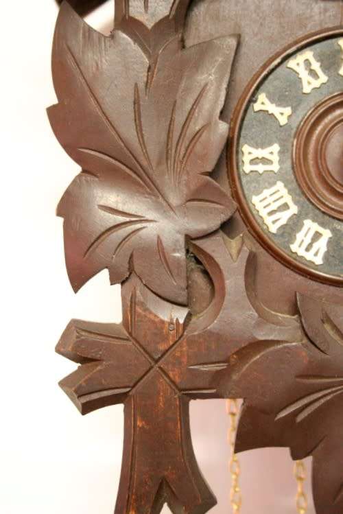 A fabulous rare original vintage hand carved German made 8-day Black Forest cuckoo clock.