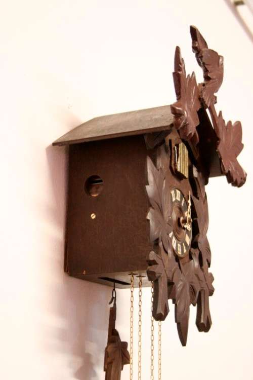 A fabulous rare original vintage hand carved German made 8-day Black Forest cuckoo clock.