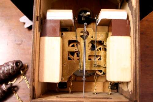 A fabulous rare original vintage hand carved German made 8-day Black Forest cuckoo clock.