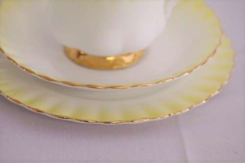 A gorgeous vintage Royal Albert porcelain trio in the beautiful "Rainbow Yellow" pattern