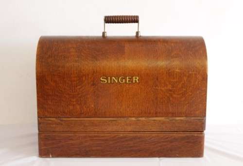 A stunning antique 1937 Singer 99K hand-cranked sewing machine w/ loads of accessories & attachments