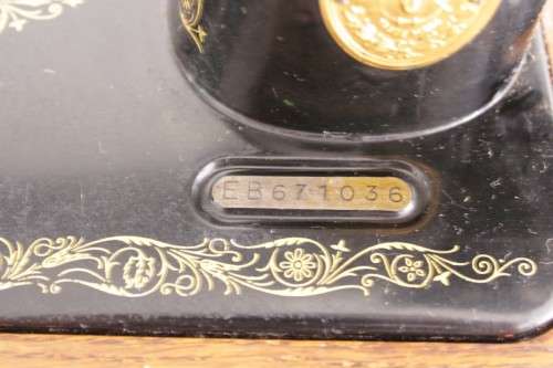 A stunning antique 1937 Singer 99K hand-cranked sewing machine w/ loads of accessories & attachments