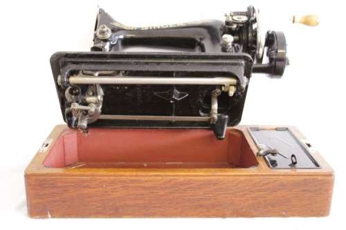 A stunning antique 1937 Singer 99K hand-cranked sewing machine w/ loads of accessories & attachments