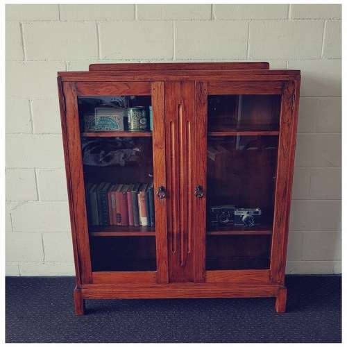 A wonderful Art Deco vintage oak display/ show cabinet with glass doors and carved detailing!
