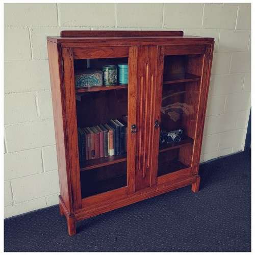 A wonderful Art Deco vintage oak display/ show cabinet with glass doors and carved detailing!