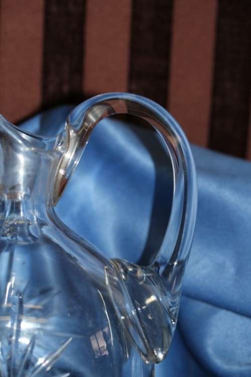 A stunning vintage lead cut-crystal water decanter/ jug/ ewer w/ a "star" pattern in great condition
