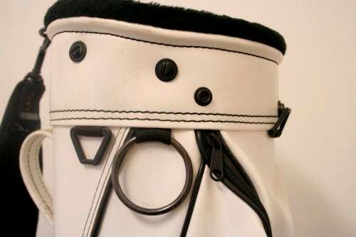A wonderful white and black strapped "golf bag". Perfect for beginners or teenagers.