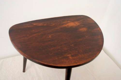 An awesome three-legged retro display/ occasional wooden table in great condition !!!