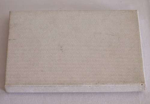 **RS17** A boxed set of Royal Dutch Silverworks "Elwezetta Line" chrome plated spoons & tea strainer