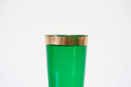 A superb vintage green Venetian glass, hand painted raised floral and gold gild detail vase.