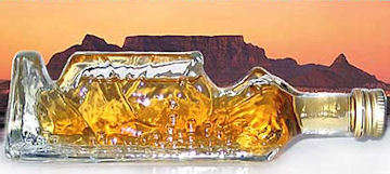 4 miniature Mountain Range sealed bottles of Cape brandy and Cream sherry, for display purposes only
