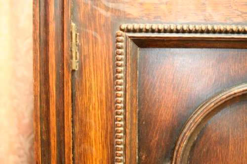 An exquisite vintage Oak side server cabinet with brass handles & loads of drawer & cupboard space