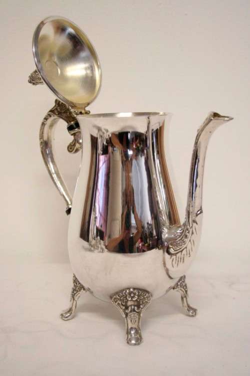 A beautiful Elweco silver plate tea set w exquisite detailing in superb condition on an ornate tray