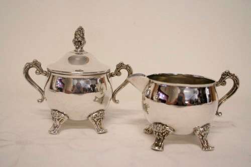 A beautiful Elweco silver plate tea set w exquisite detailing in superb condition on an ornate tray