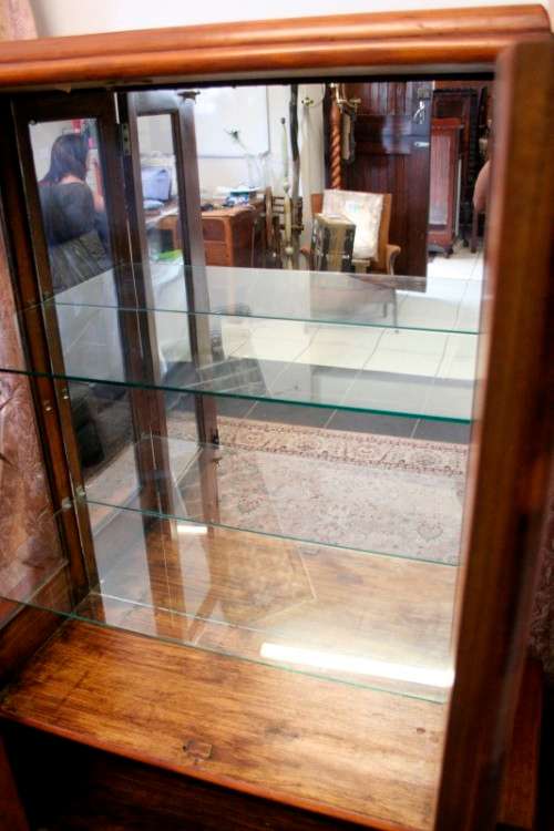 **RS17** An Art Deco display/ show cabinet with glass doors and a large bottom double door cupboard