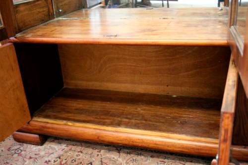 **RS17** An Art Deco display/ show cabinet with glass doors and a large bottom double door cupboard