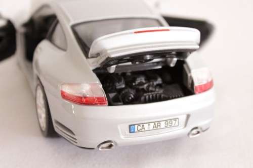 A stunning silver 1/18 scale (1999) Porsche 996 Turbo die-cast model car by Bburago