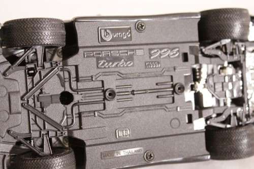 A stunning silver 1/18 scale (1999) Porsche 996 Turbo die-cast model car by Bburago