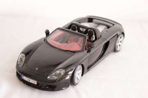 A fantastic black 1/18 scale (2005) Porsche Carrera GT die-cast model car by Motormax