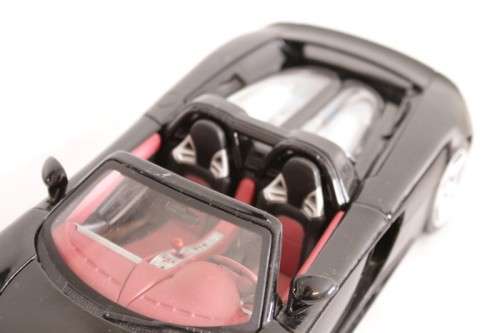 A fantastic black 1/18 scale (2005) Porsche Carrera GT die-cast model car by Motormax