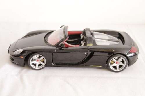 A fantastic black 1/18 scale (2005) Porsche Carrera GT die-cast model car by Motormax