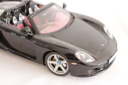 A fantastic black 1/18 scale (2005) Porsche Carrera GT die-cast model car by Motormax