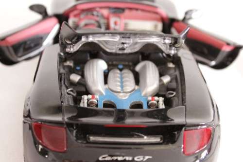 A fantastic black 1/18 scale (2005) Porsche Carrera GT die-cast model car by Motormax