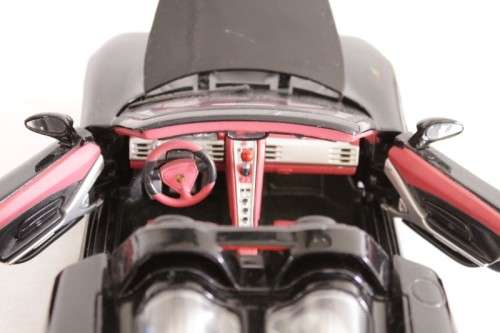 A fantastic black 1/18 scale (2005) Porsche Carrera GT die-cast model car by Motormax