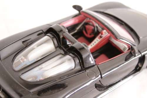 A fantastic black 1/18 scale (2005) Porsche Carrera GT die-cast model car by Motormax