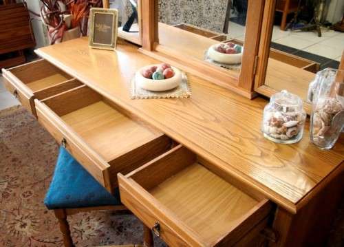 An exquisite, large Oak three drawer side-folding mirror dressing table with two cupboards and stool