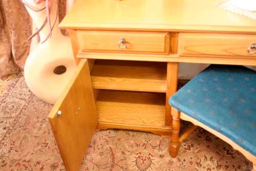 An exquisite, large Oak three drawer side-folding mirror dressing table with two cupboards and stool