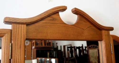 An exquisite, large Oak three drawer side-folding mirror dressing table with two cupboards and stool