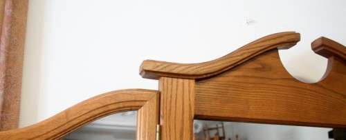 An exquisite, large Oak three drawer side-folding mirror dressing table with two cupboards and stool