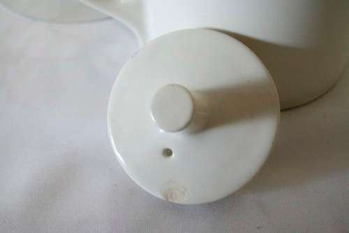 A fabulous German made vintage1960's coffee pot with removable thermal cover.