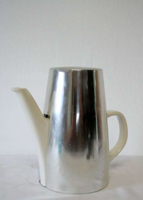 A fabulous German made vintage1960's coffee pot with removable thermal cover.