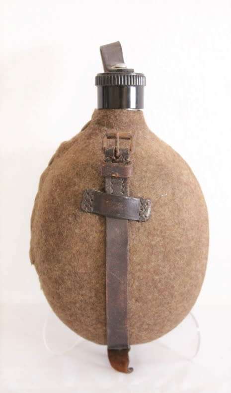 An awesome vintage WWII German/ Czechoslovakian aluminium water canteen with a felt covering