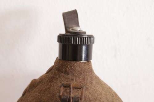An awesome vintage WWII German/ Czechoslovakian aluminium water canteen with a felt covering