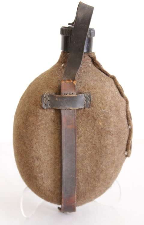 An awesome vintage WWII German/ Czechoslovakian aluminium water canteen with a felt covering