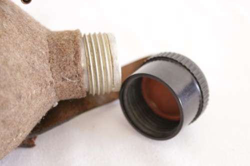 An awesome vintage WWII German/ Czechoslovakian aluminium water canteen with a felt covering