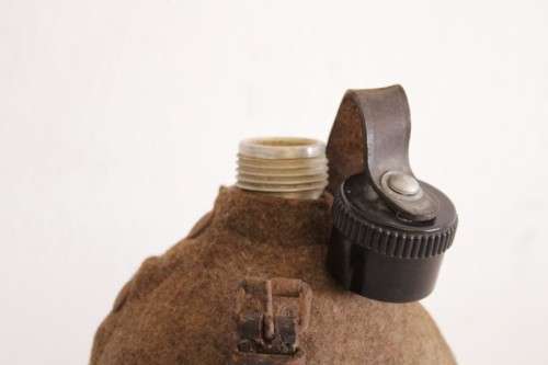An awesome vintage WWII German/ Czechoslovakian aluminium water canteen with a felt covering